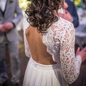 Beautiful long sleeve lace dress with open back